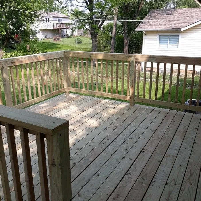The same deck rehabbed with new decking and railings