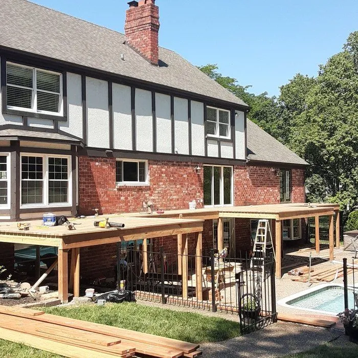 The same deck under construction showing framing and joists